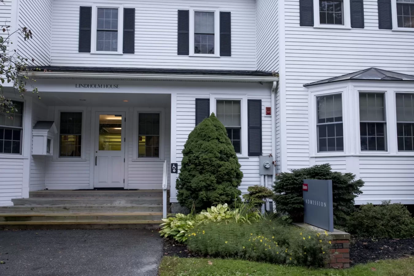 Admission sign in front of Lindholm House on Campus Avenue.