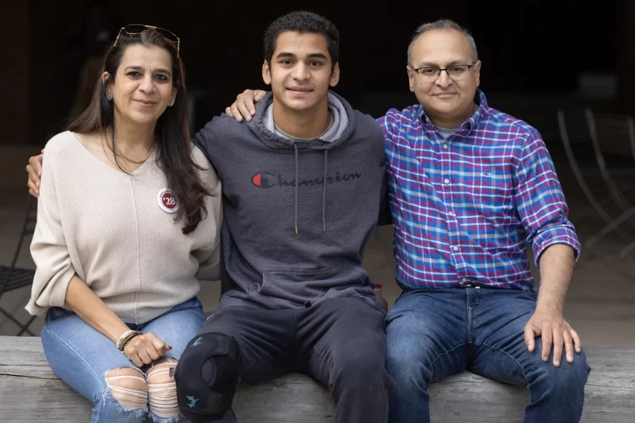 Various scenes from Friday afternoon, on Sept. 27, 2024.  during Back to Bates Weekend, as families arrive on campus to register and spend time together.

Aarav Worth ’28 of NYC with parents Ami Kantawala (left) and father Samrat Worah.