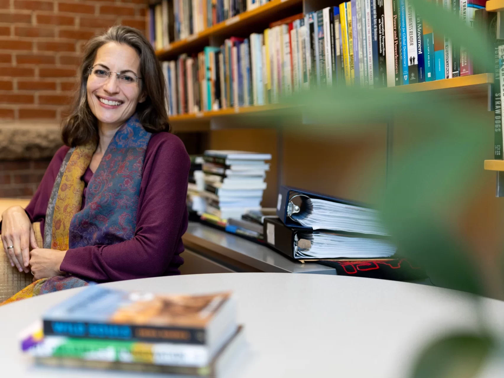 Sonja Peck, Clark A. Griffith Professor of Environmental Studies, poses for a portrait in her Hedge 113 office on Sept. 26, 2024.