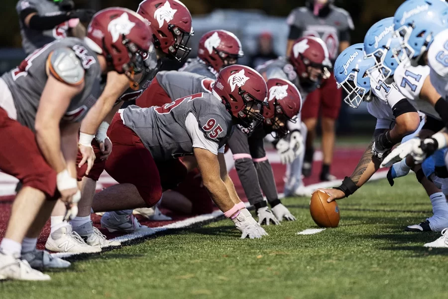 The Bates defensive line gets ready to rush the Tufts quarterback under