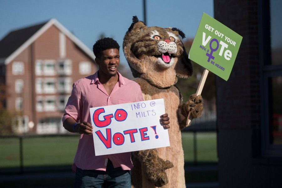 Election Day 
Marcus Delpeche '17 of Wilmington, Del., and the Bates Bobcat encourage members of the Bates community to vote today. Inside Commons, students distributed information about six statewide ballot initiatives and recorded the number of students who had voted in today's election.