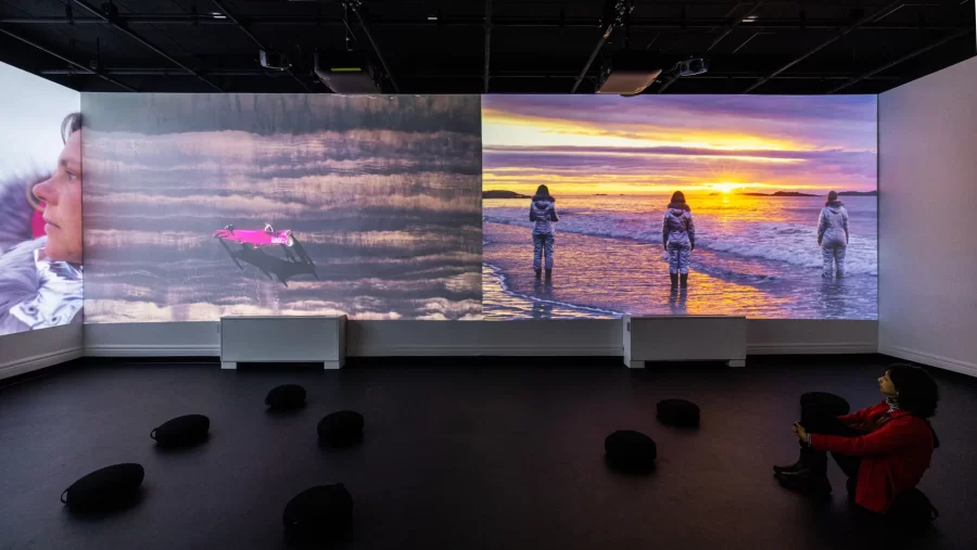 Viewers watching a video in the Immersive Media Studio