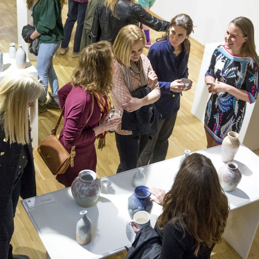 The 2016 Senior Thesis Exhibition and reception at the Bates College Museum of Art is filled with beautiful work and excited visitors The artists will be there to greet you! 

"Someone came in here and looked at our stuff and said 'you guys are really vibing off of each other.'"
-- Sasha Lennon '16 of Cape Elizabeth, a double major in studio art and psychology (left) and Natalie Silver '16 of Bennington, Vt., a double major in studio art and history, throw pots for the Annual Senior Exhibition in their ground-floor Olin Arts studio. As co-coordinators of the Annual Entering Student Outdoor Program (along with classmate Jordan Cargill), they are close friends who share not only a studio but also an interest in the balance of form and function in their ceramic art. (Phyllis Graber Jensen/ Bates College)