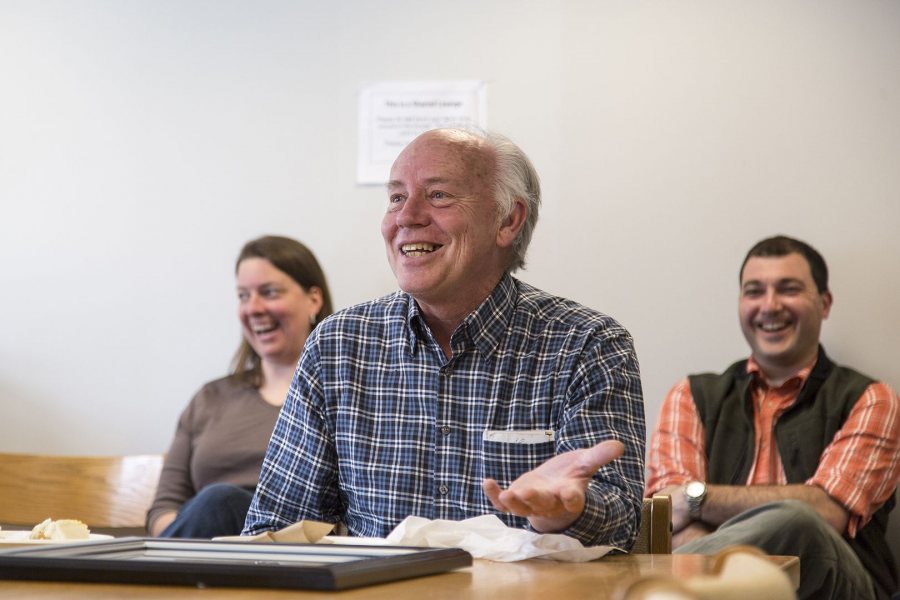 Students, faculty, staff, and alumni gather in Carnegie Hall to celebrate the retirement of Gene Clough, a longtime member of the physics and astronomy faculty. (Josh Kuckens/Bates College)