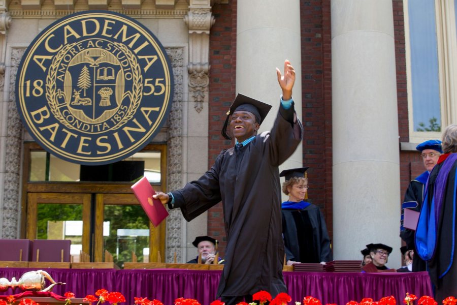 Gideon Ikpekaogu '17 of Amsterdam, the Netherlands, leaves the stage after receiving his bachelor's degree in economics. (Phyllis Graber Jensen/Bates College)