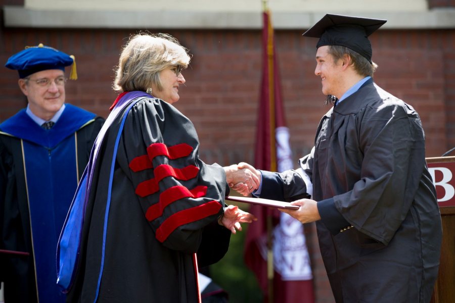 President Clayton Spencer awards Cormac Walsh '17 of Biddeford, Maine, a bachelor of science degree in biological chemistry. (Phyllis Graber Jensen/Bates College)
