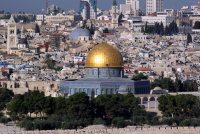 Interest in Hellenistic learning in the Islamic world extended to architecture, exemplified in the Dome of the Rock Mosque, and the Church of the Holy Sepulchre to its left in Jerusalem. 