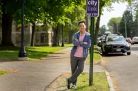APPROVED, Alan Wang ’24 on College Street in front to Parker Hall where covered bus stop will be built on lawn behind him. 11/13/2023 16:25:54 Transportation for Bates awang3@bates.edu 5075817683 Student Better Bus Stop for Bates The MaineDOT is planning on implementing a commuter bus line between Lewiston and Portland. The bus line is set to terminate at Bates near Underhill Arena. However, the bus stop might not be pleasant and intuitive to use. Study from University of Minnesota show that bus stop amenities have a direct relationship with rider's perceived waiting time; having a bench can reduce the perceived waiting time by half compared to a stop without a bench. A well-equipped bus stop can entice more people to use it, thus reducing Bates' carbon footprint. "A bus shelter costs around $5,500. I want to apply for the full $2,000 grant to ultimately put this money back in the school's pocket, in the form of a well-designed bus shelter. This green fund can be a part of a larger funding package, I'm assuming that MaineDOT and the operator of this bus line will both pitch in to fund this shelter. The bus shelter should protect riders from weather elements, display proper signage and maps, equip with lighting and seating. MaineDOT also recommends installing bike racks and trash cans. The green grant can be used to achieve aspect(s) of the above objectives. " Increase comfort level when using public transportation. Reduce perceived waiting time. Encourage faculties and staff to commute using public transportation, thus reducing GHG emissions and free up parking spots.