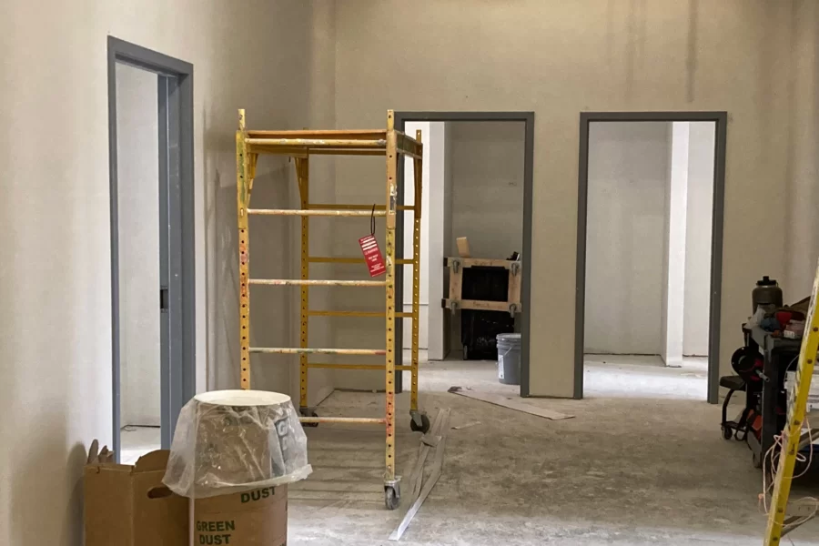 Doorframes, like these shown at the entrances to second-floor student rooms, are being fitted throughout 96 Campus Avenue. (Doug Hubley/Bates College)