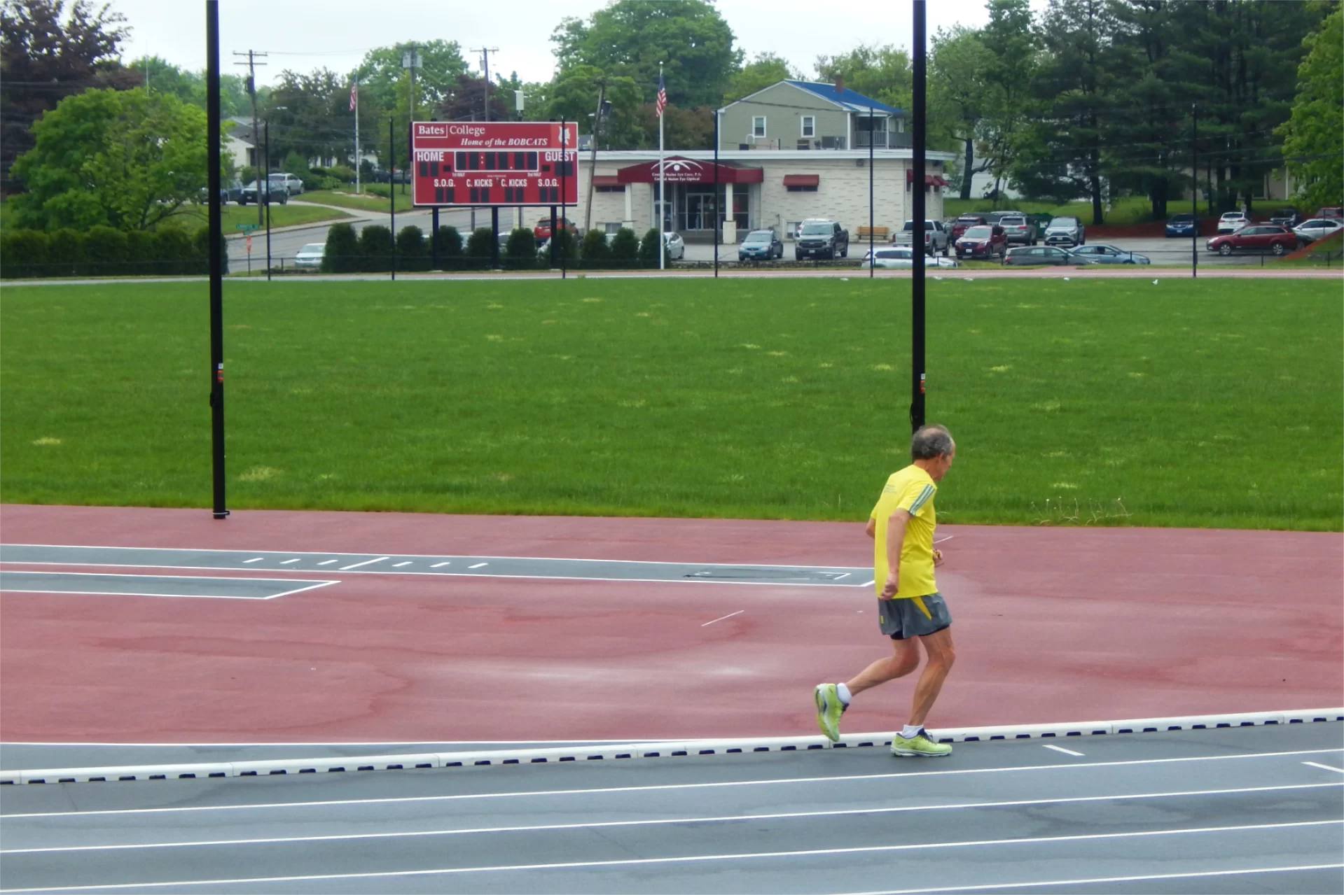 The Russell Street track in use on May 28. Dating from 2019, all the living grass within the track will be replaced with artificial turf during summer 2024. (Doug Hubley/Bates College)