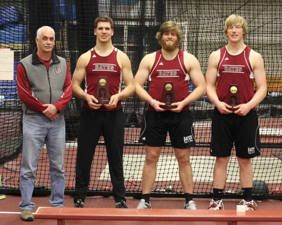 March 12, 2011: Fereshetian poses three of his greatest throwers, Chris Murtagh ’11, Ethan Waldman ’11, and David Pless ’13 after their All-American performances at the 2011 NCAA Division III Indoor Track and Field Championships. (Tom Leonard '78)