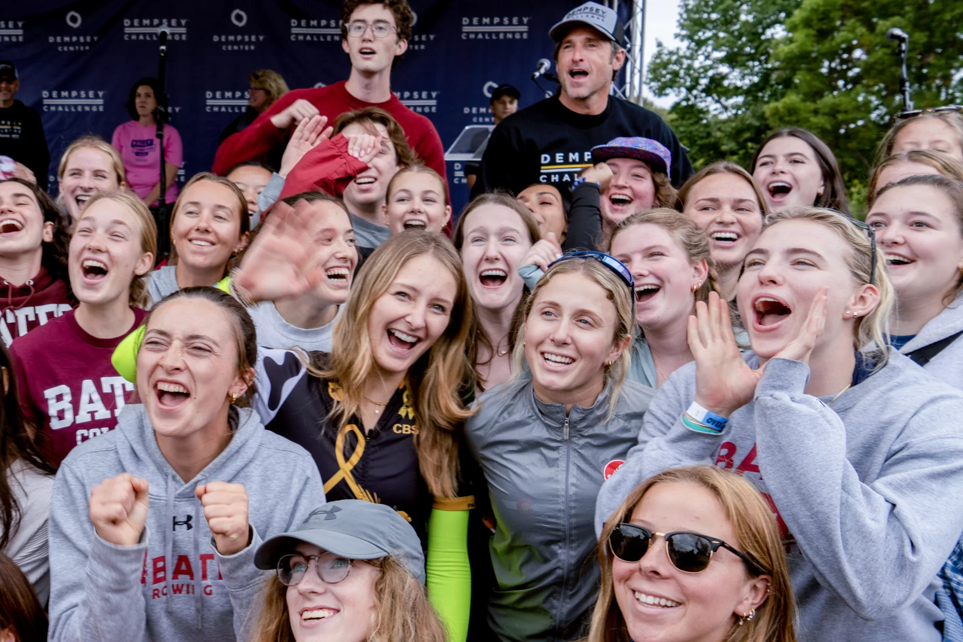 groups of college students cheering.