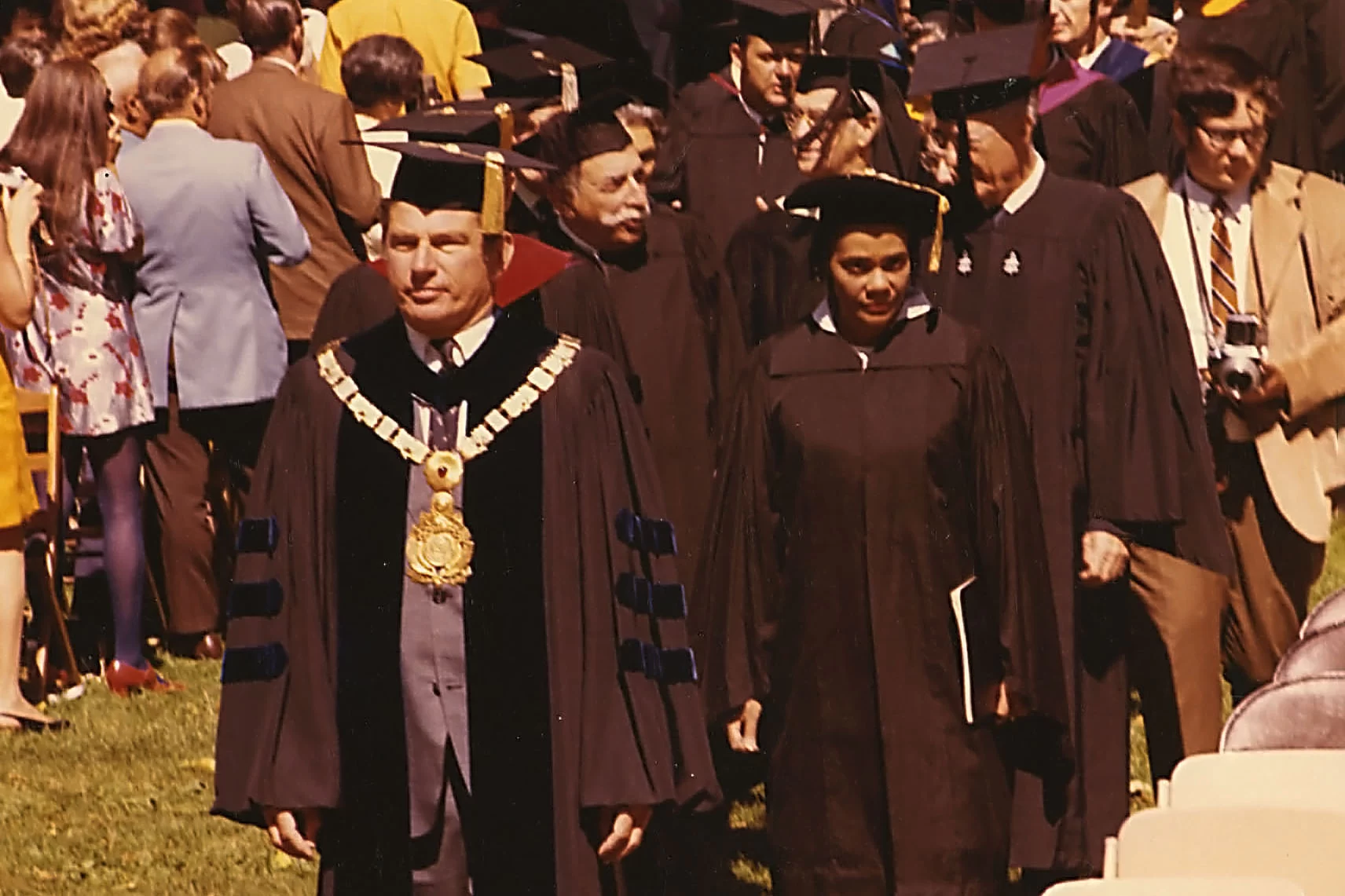 college president leading an academic procession in 1971