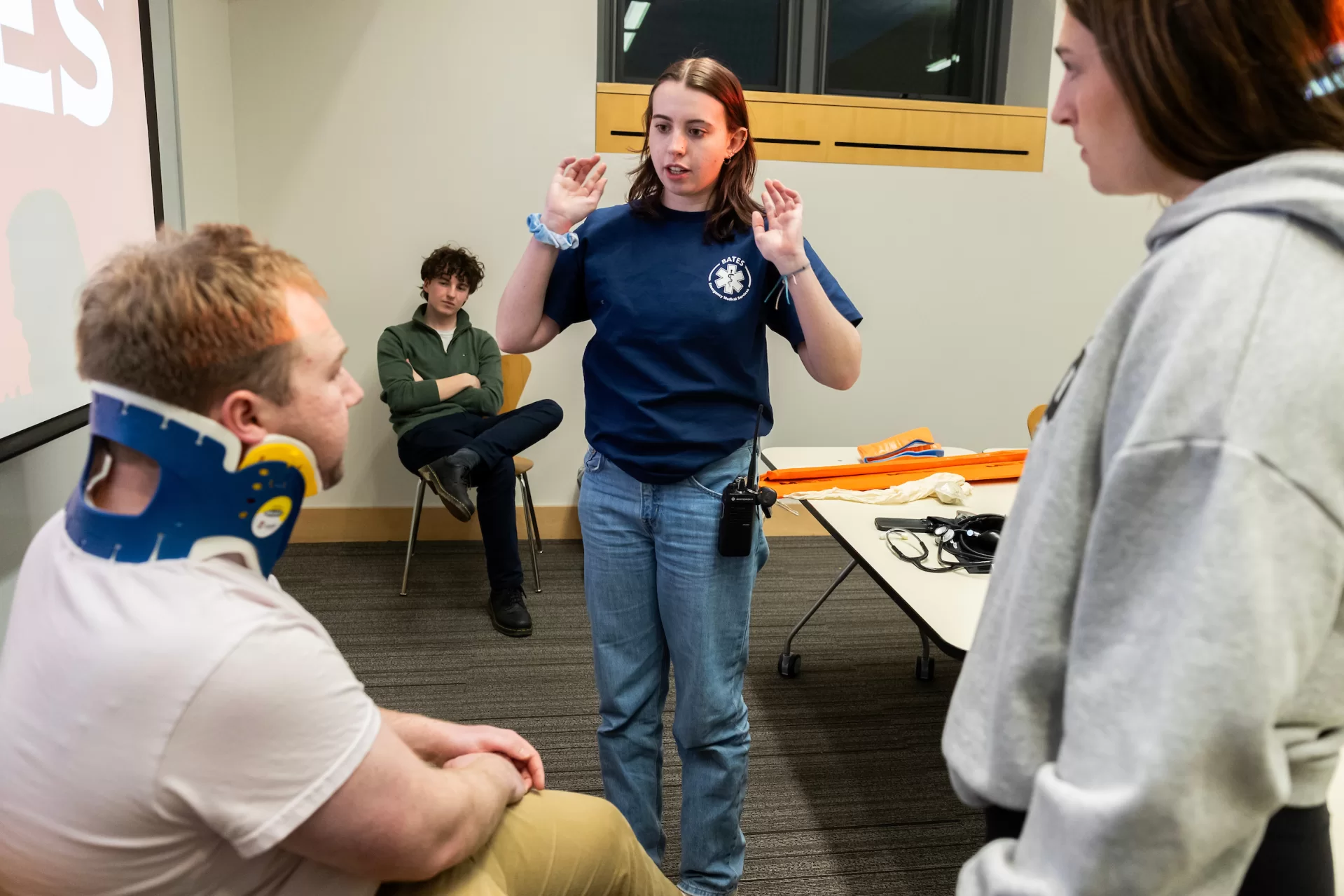 Baes EMS leadership holds a training session for students on the second floor of Commons on the evening of April 2, 2024.

Co-Presidents Ned Friedman ’24 of Park City, Utah (in hallway with blue sweatshirt), and Noah Bachner ’25 of Weston, Conn., (inside classroom with students)  are joined by Colton Sochia ’25 (left at blackboard) of Dallas and Leo Smart ’25  (right at blackboard) of Salt Lake City.