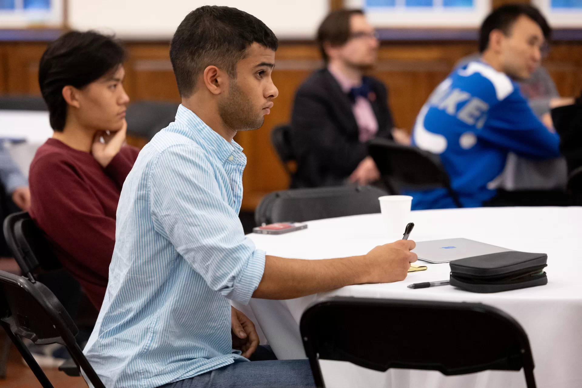 student taking notes