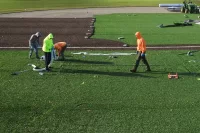 Images of Leahey Field showing partial installation of FieldTuf on the infield. Part of the infield will be brown, where the traditional dirt and basepaths would be, and elsewhere green.