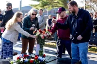 On Veterans Day, we pause to reflect and remember. During this morning’s gathering at Bates Veterans Plaza, Joe Castonguay of Facility Services lays a flower atop one of the basalt stones that comprise the plaza centerpiece. “I learned the value of human life in combat,” said Castonguay, a U.S. Army veteran who served for 15 months in Iraq. The Rev. Dr. Brittany Longsdorf, @bates_multifaith chaplain, guided today’s centering moment, which included reflective readings and interfaith prayers, the observing of silence, and the ritual of laying flowers to honor the service and sacrifice of veterans. Dedicated in 2020 and located near the Benjamin E. Mays Center, the plaza honors Bates veterans and invites “reflection on the impact of war on the lives of everyone it touches.” President Garry W. Jenkins was in attendance.