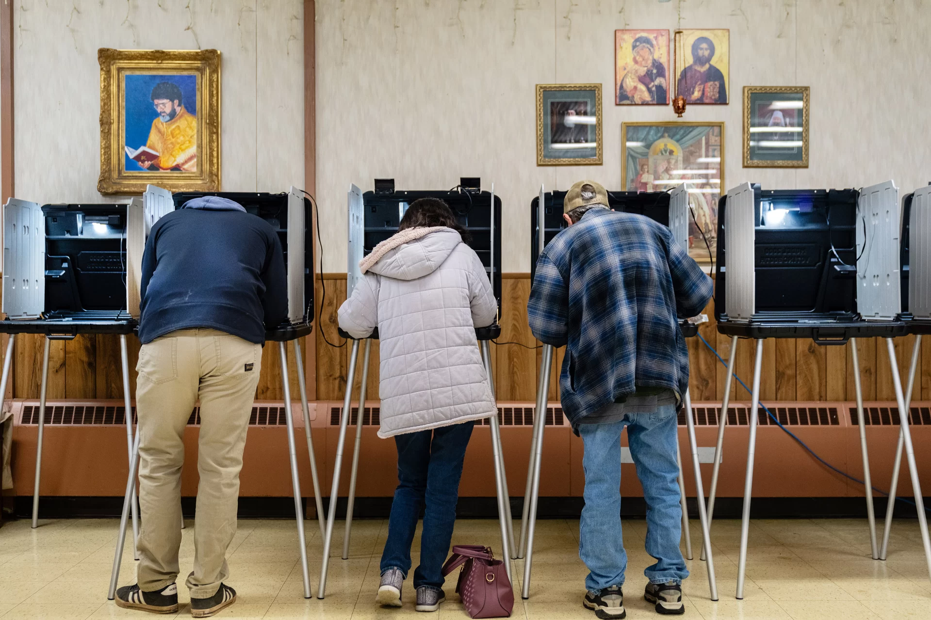 three people voting