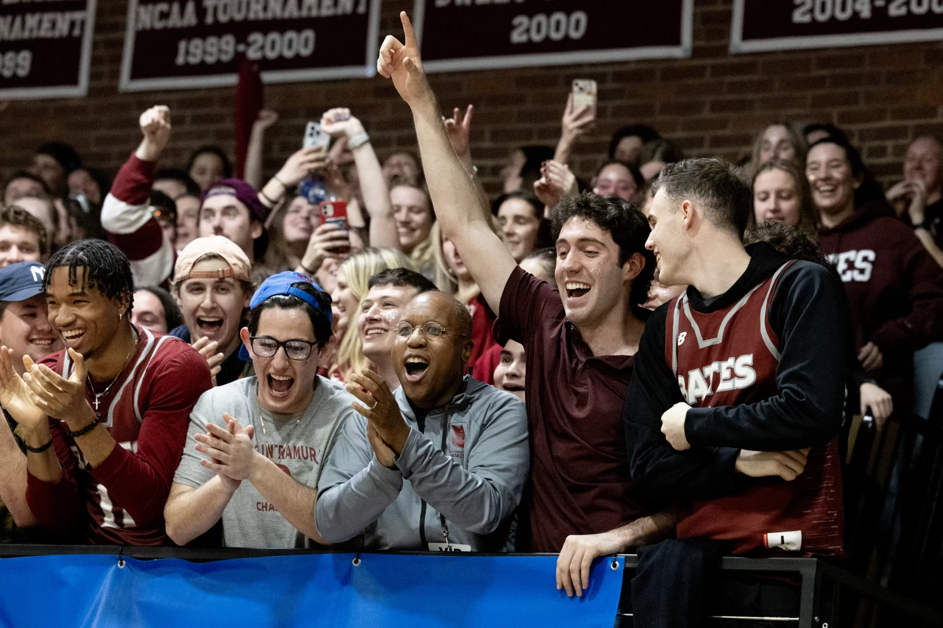 Bates defeated Widener Univeristiy 79-66 in Div III NCAA championship playoffs held in Alumni Gymnasium on March 2, 2024. President Garry W. Jenkins joins the fans on th stage bleachers during the last 90 or so seconds at the end of the game after the gym chanted “We want Garry!.”