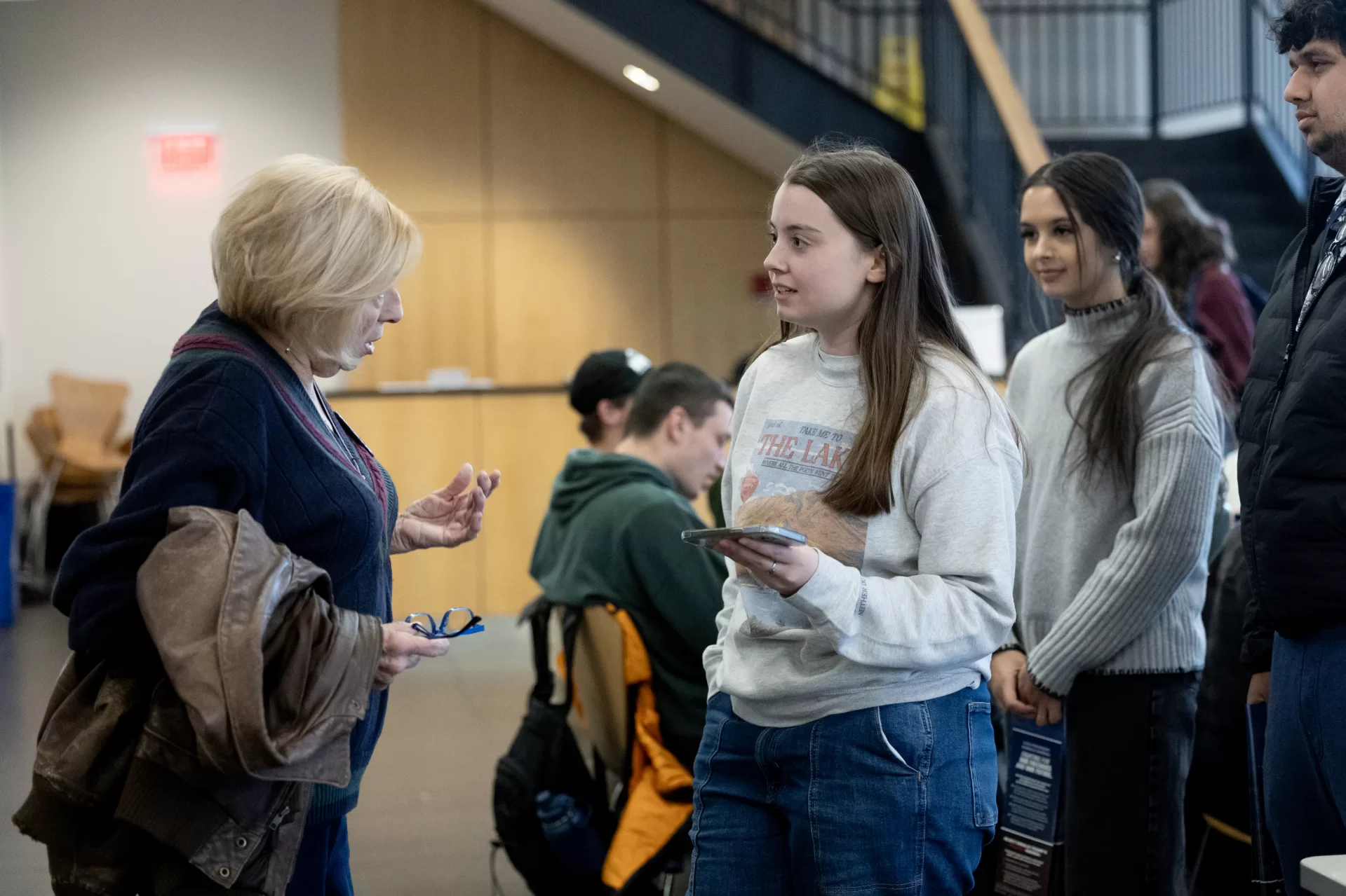 woman talking to a student