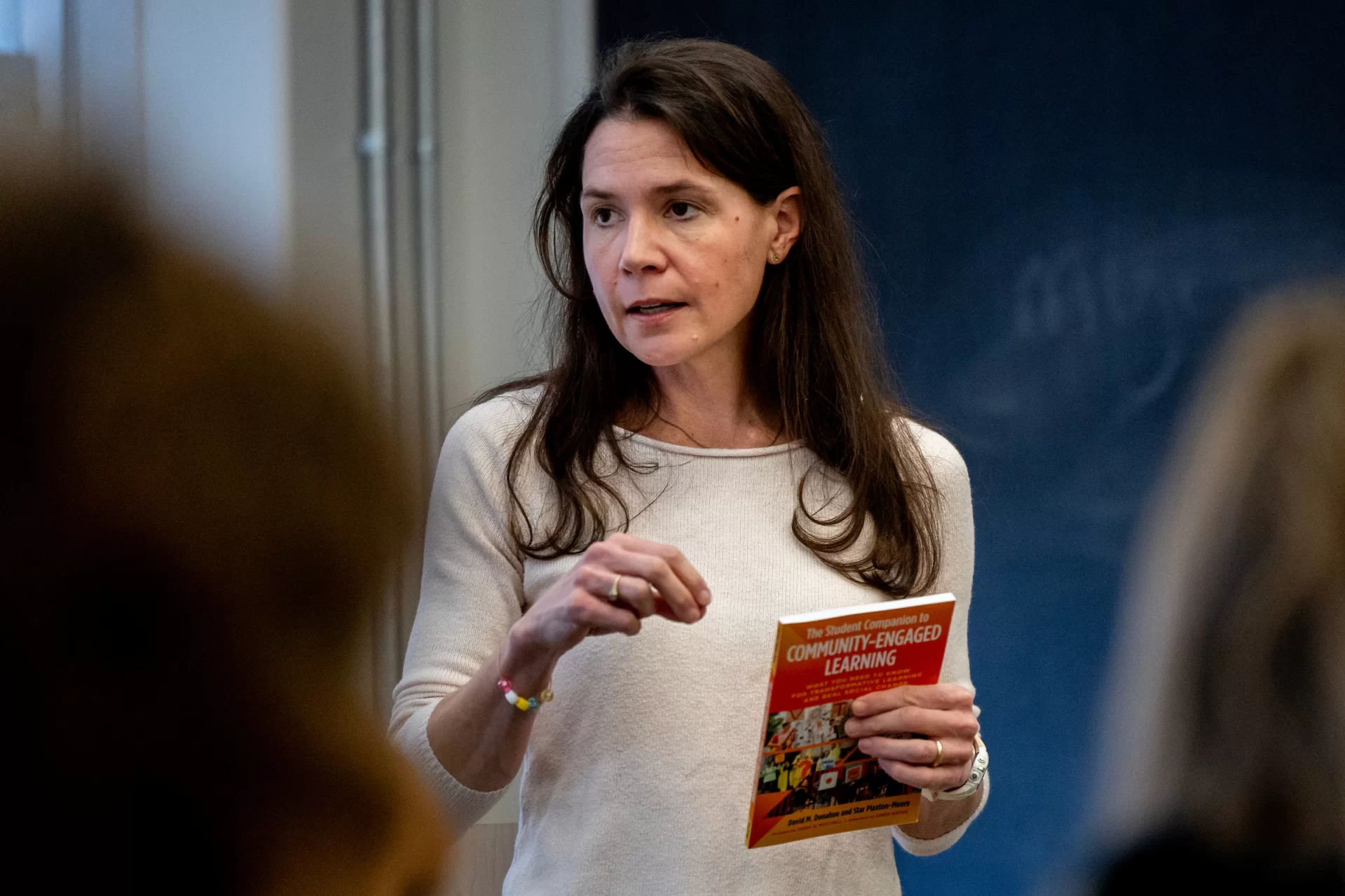 Associate Professor of Education Mara Tieken, winner of the 2024 Kroepsch Teaching Award, teaches students in her course “EDUC 231 - Perspectives on Education” in Pettigrew 30 on January 16, 2025.

EDUC 231 - Perspectives on Education
This course introduces students to foundational perspectives (anthropological, historical, philosophical, psychological, and sociological) on education and helps students apply these perspectives to contemporary schools and classrooms. The course considers several large questions: What should be the purpose of education in a democratic society? What should be the role of the school? Who should participate in making decisions about schools? In what ways do schools reflect and perpetuate larger social inequities, and, alternately, how can they contribute to a more just and inclusive society? Students must complete at least thirty hours of fieldwork.