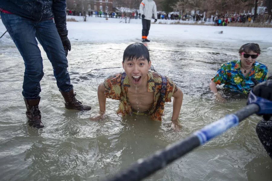 at the Puddle Jump on January 18, 2013. Several hundred students jumped into Lake Andrews on the campus of Bates College on a day that saw a high temperature of 16 degrees. The annual tradition is part of the college's Winter Carnival.