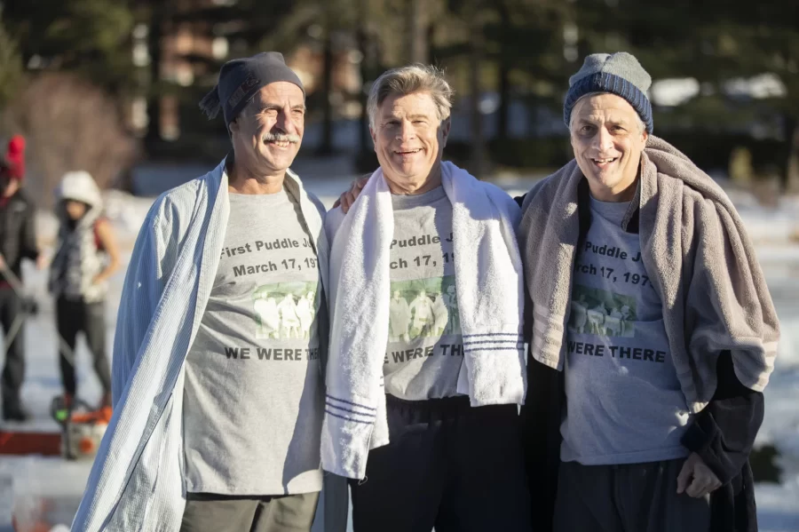 As students cheer them on, Class of 1978 alumni (from left) Chris Callahan, Lars Llorente, and Scott Copeland — originators of the Puddle Jump tradition in 1975 — make their way onto Lake Andrews to kick off this year's jump.
.
Swipe left for some more of this afternoon's action. And read the story of the Bates students who, in 1975, leapt at the chance to create the Puddle Jump tradition by clicking on the link in our bio.