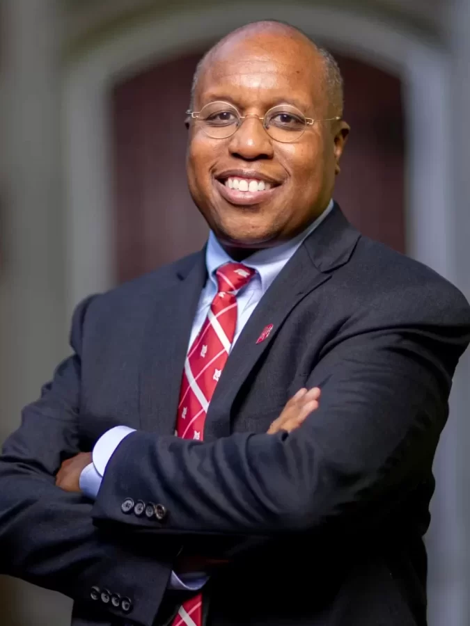 President Garry W. Jenkins poses for portraits adjacent to Alumni Gym, the Muskie Garden, and on the Historic Quad in front of Hathorn Hall.