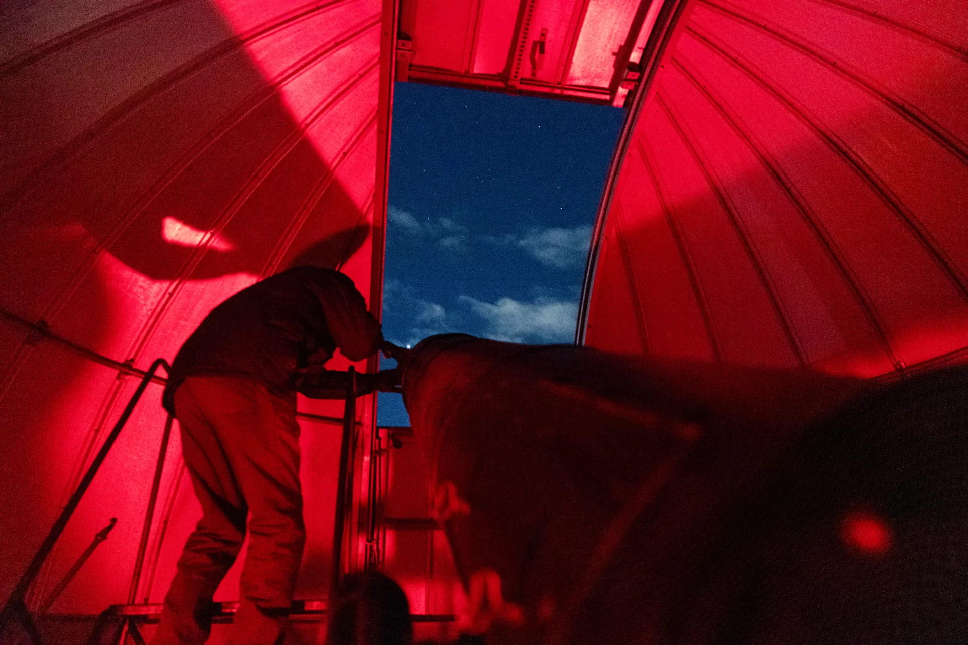 Evan Boxer-Cook ’26, of Scarborough, Maine, leads the Bates Astronomy Club from Carnegie 321 to the Stephens observatory, located on the roof of Carnegie, on January 15, 2025. (Theophil Syslo | Bates College)