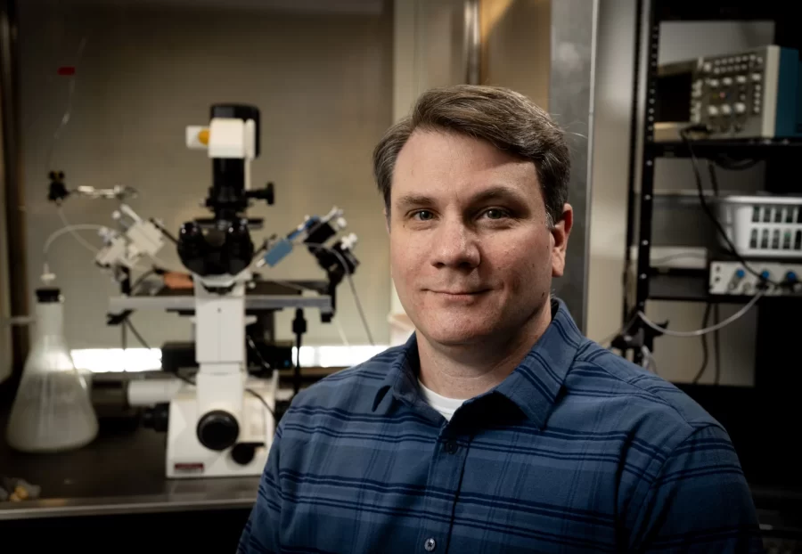 Ryan Bavis, Bates Helen A. Papaioanou Professor of Biological Sciences, posing in his Bonney Science Center laboratory  and office.

Bavis is collaborating with his friend and colleague Peter MacFarlane, assistant professor at the Case Western Reserve University School of Medicine on their discovery of a novel animal model mimicking sudden infant death syndrome. 

Last year, the National Institutes of Health awarded the scientists a $2.8 million grant to study the model over five years. MacFarlane is the project’s principal investigator, and $307,495 is allocated to Bates. Dr. Richard Martin of Rainbow Babies and Children’s Hospital and professor at CWRU’s School of Medicine is also a co-investigator on the project.