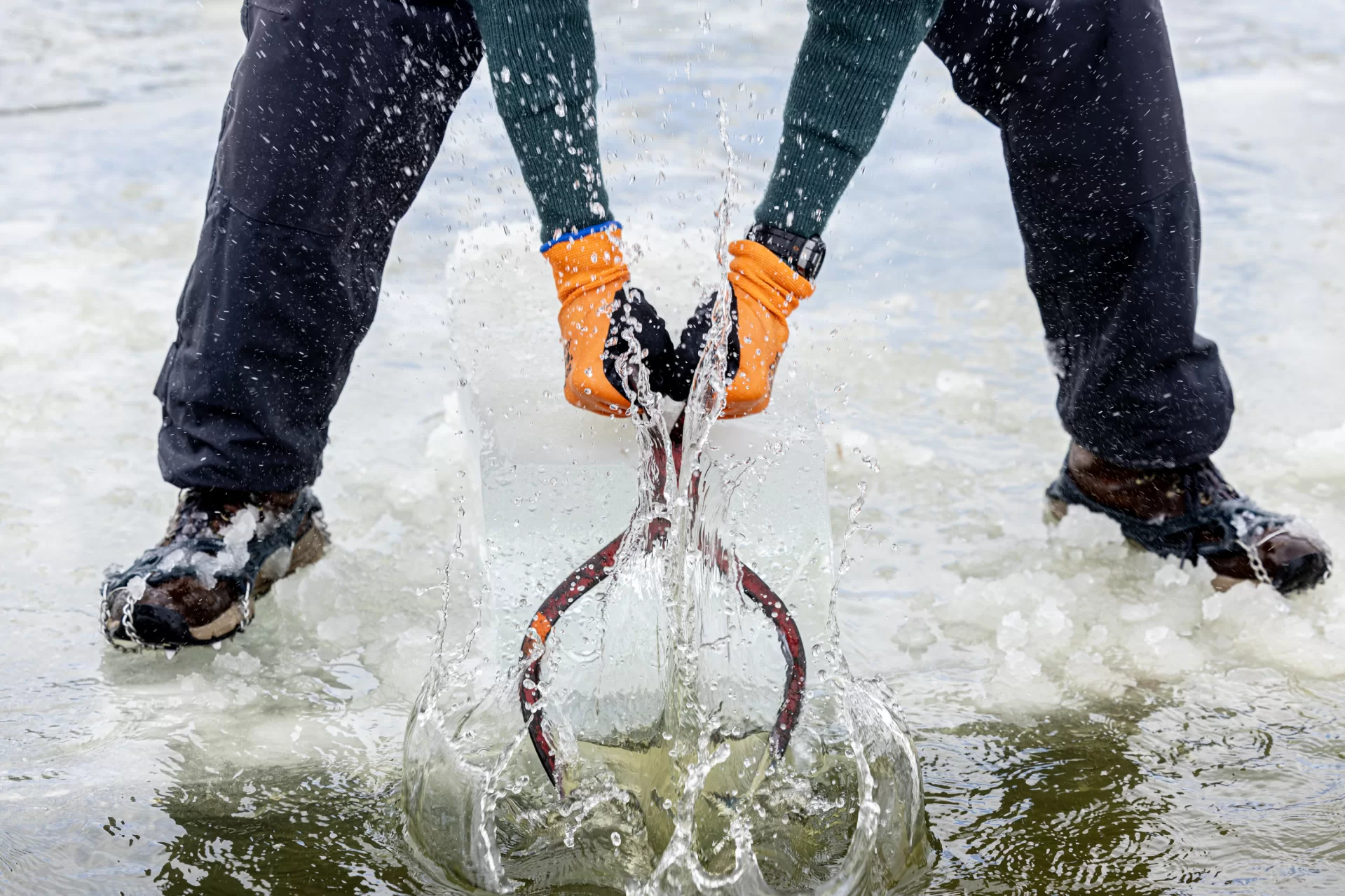 Cutting the ice in preparation for the 50th-anniversary edition of the Puddle Jump.

Nick O'Brien, senior director of digital marketing for the Bates Communications and Marketing Office, makes a test jump.