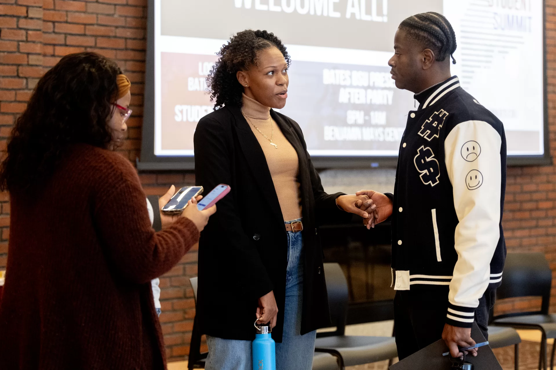 Bates, Bowdoin, and Colby Black Student Summit, Saturday, February. 8, from 11 a.m. to 8 p.m. on the Bates campus, hosted this year by the Student Center for Belonging and Community (SCBC).

These photographs were taken in Chase Hall, I Chase Hall Lounge (arrival and checkin, student and alumni panel, and Fireside Chat with BBC leadership). Lunch and mingling was in Memorial Commons.

“When I dare to be powerful, to use my strength in the service of my vision, then it becomes less and less important whether I am afraid,”   — Audre Lorde

Student and Alumni Panel
Students
Bates: Rashad King ’25 and Naomi Maloney ’28
Bowdoin: Ephraim Tutu ’28
Colby: Hadia Killang ’25 and Naj Yerokun ’26

Alumni
Bates: Loseni Barry ’22 and Marissa Phoenix ’15
Bowdoin: Jasmine Ross ’14
Colby: Brian Guillery ’16 and Jamaal Grant ’16

Fireside Chat — BBC Leadership
Bates: Rosanna Ferro, VP for Student Affairs
Bowdoin: Katie Toro-Kerrari, Senior Associate Dean for Student Affairs
Colby: Gustavo Burkett, Dean of the College

Other activities, not photographed, included  student-led line dancing and music workshops, trivia, pre-assigned workshops on burnout prevention, imposter syndrome, and Black Masculinity, along with dinner  in Commons and a BSU mixer and dance in the Mays Center.