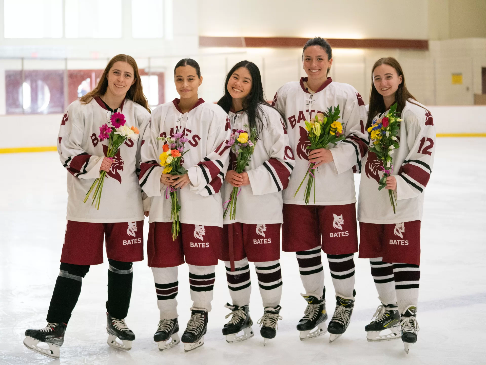 January 1st, 2025 - Underhill Arena Club women’s ice hockey defeated UMaine 3-2 in overtime, the exciting game was made even more special by the celebration of the team’s seniors (from left to right) Julia White ’25, Lydia Carlos ’25, Miranda Eisennman ’25(captain), Olivia Hall ’25, and April McCall ’24(captain).