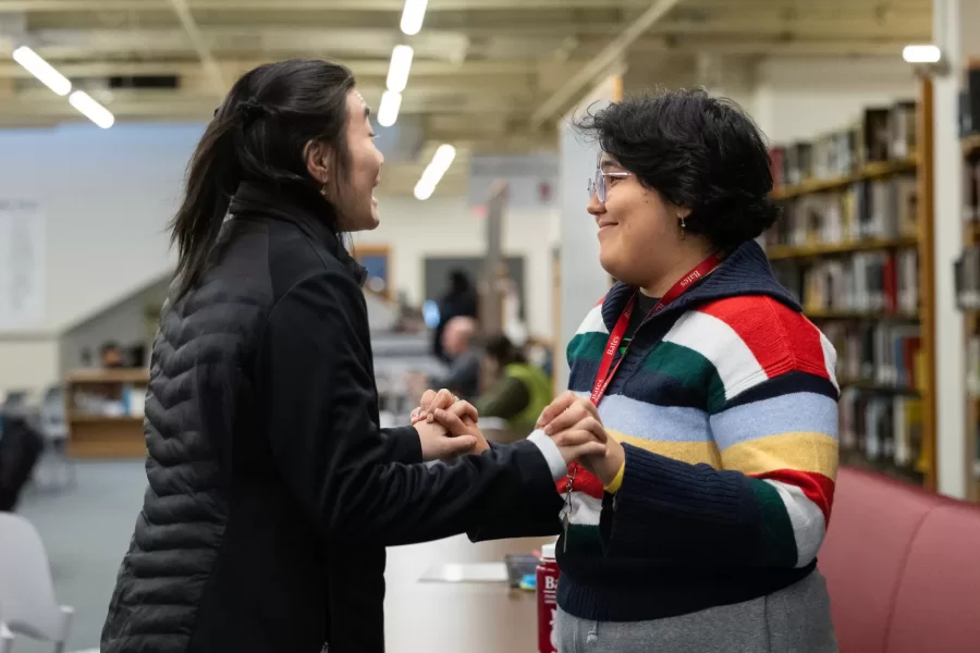 It’s a place of peer learning — and connection.

ZZ Liang of Norwell, Mass., (left) and Adriana Pastor ’25 of Asunción, Paraguay, confer in the Peer Learning Commons (PLC) on the ground floor of Ladd Library, where they briefly discussed their upcoming exam in “Mechanisms of Memory,” a neuroscience course taught by Visiting Assistant Professor of Biology and Neuroscience Glen Ernstrom. Their conversation was punctuated with hello and goodbye hugs.

The Peer Learning Commons, adjacent to the Office of Accessible Education and Student Support, houses the Student Academic Support Center and the Student Writing and Language Center.